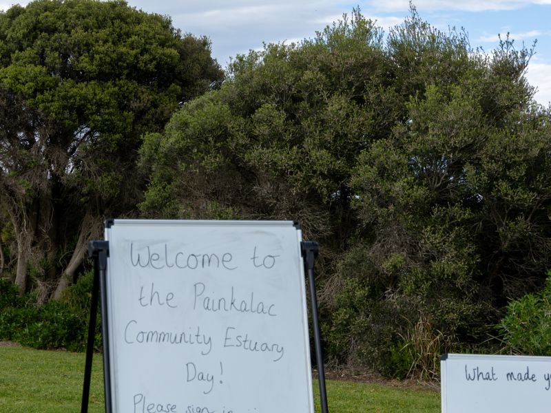 Sign at estuary stating welcome to the estuary day